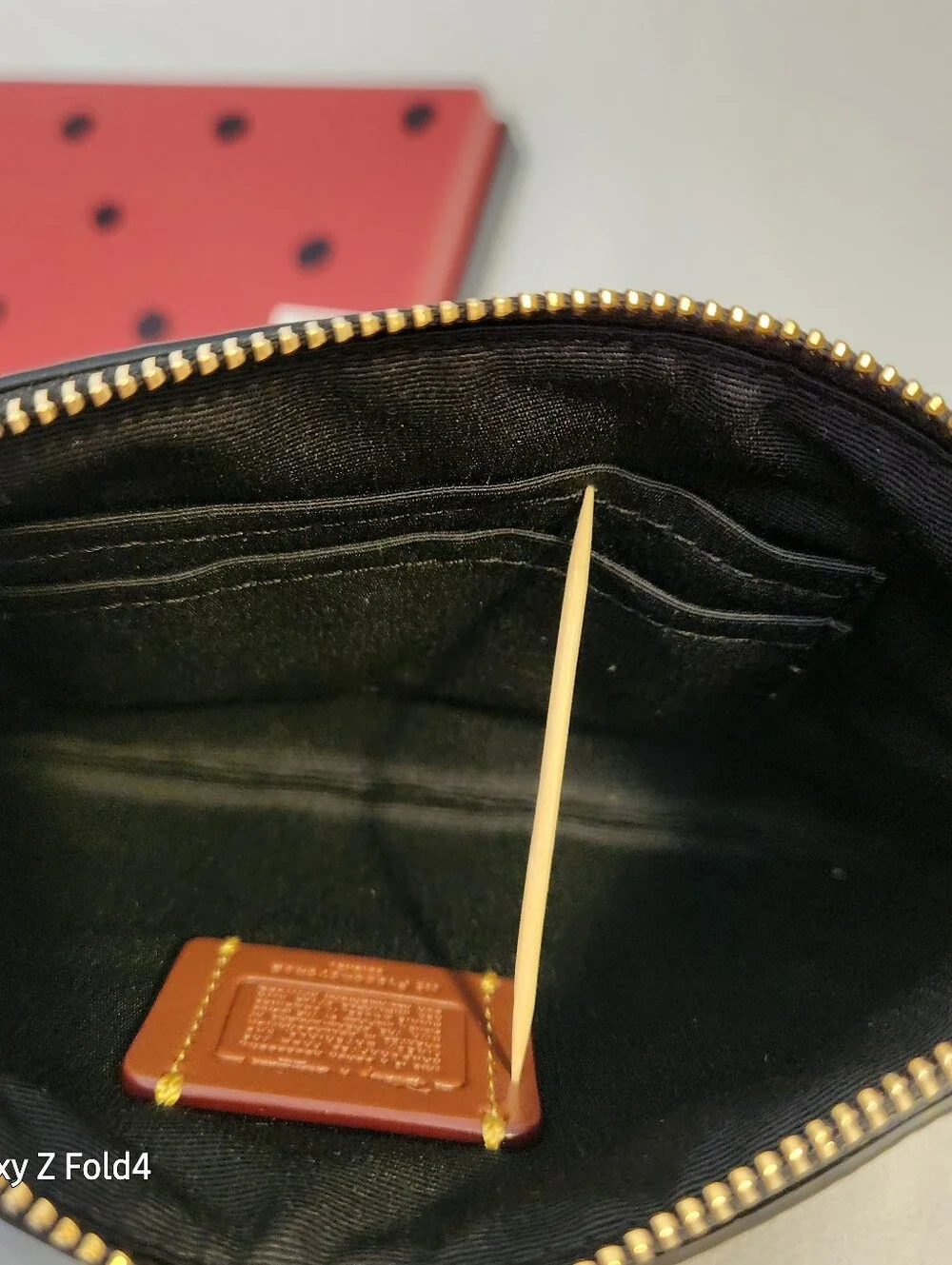 Coach Black Leather Minnie Mouse Wristlet with Gold Hardware